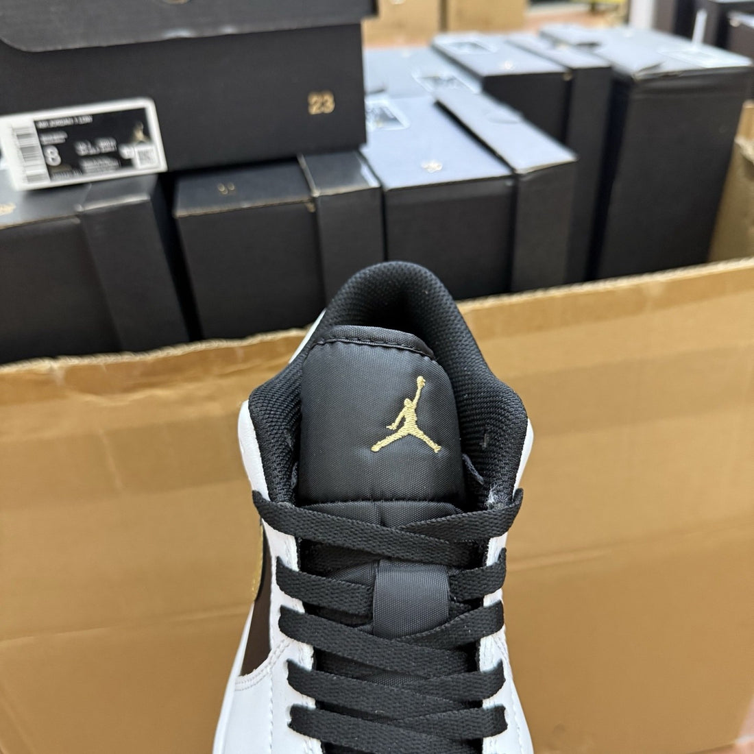 Air Jordan 1 Low Black Gold Swoosh