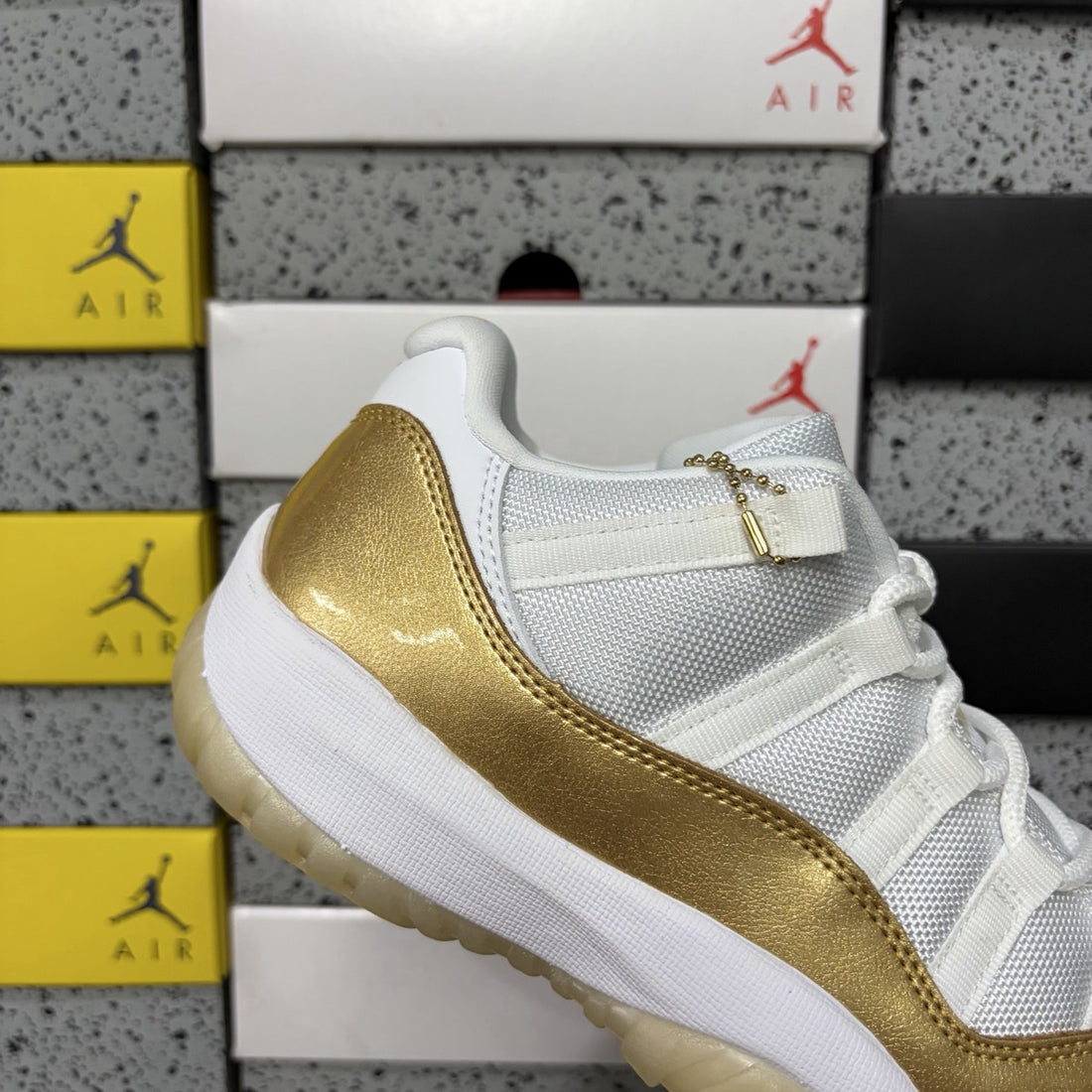 Air Jordan 11 Low Metallic Gold