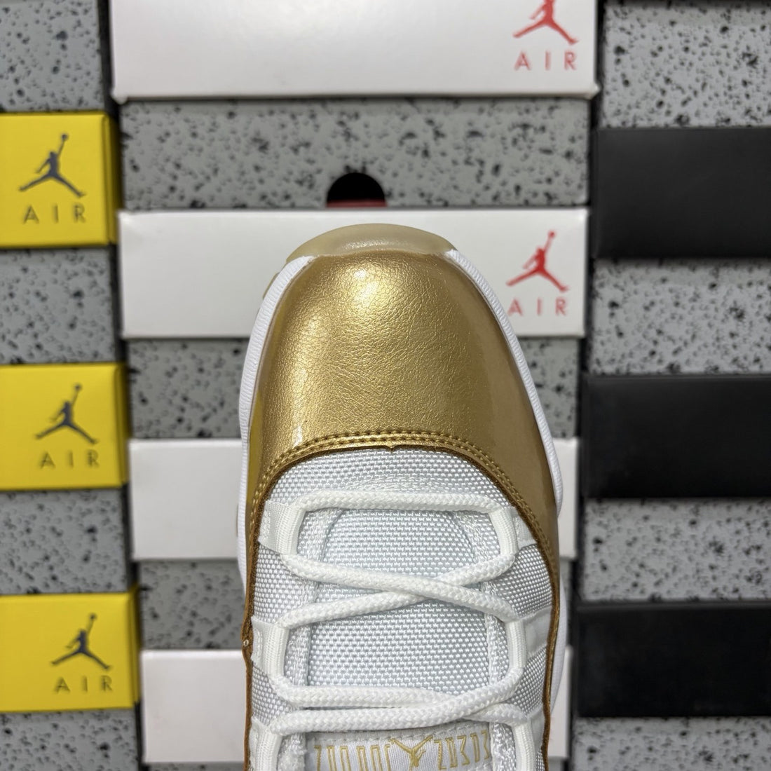 Air Jordan 11 Low Metallic Gold