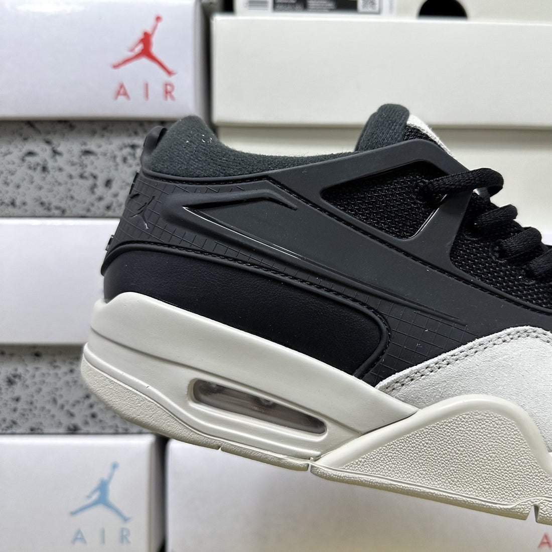 Air Jordan 4 RM Black Cream Grey