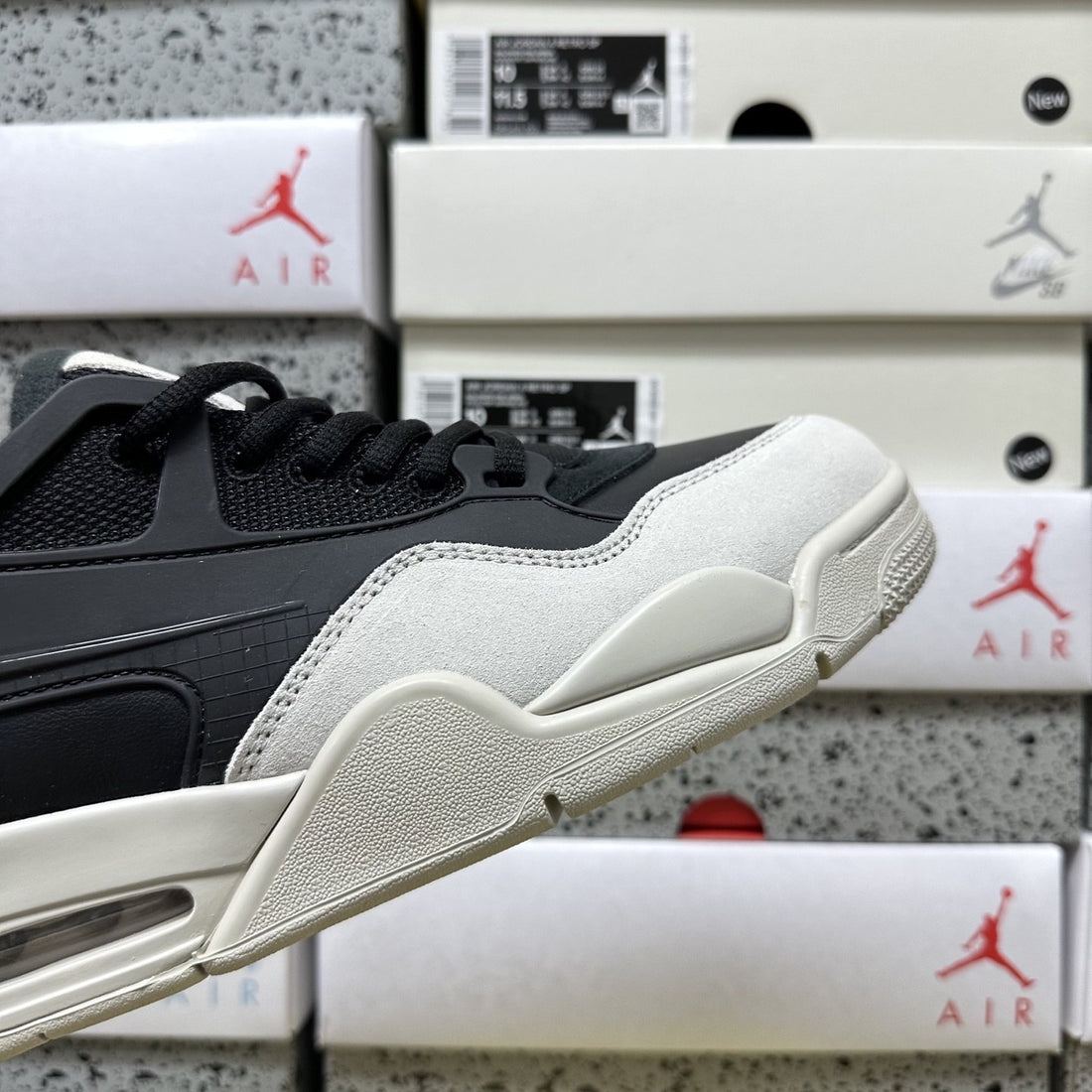 Air Jordan 4 RM Black Cream Grey