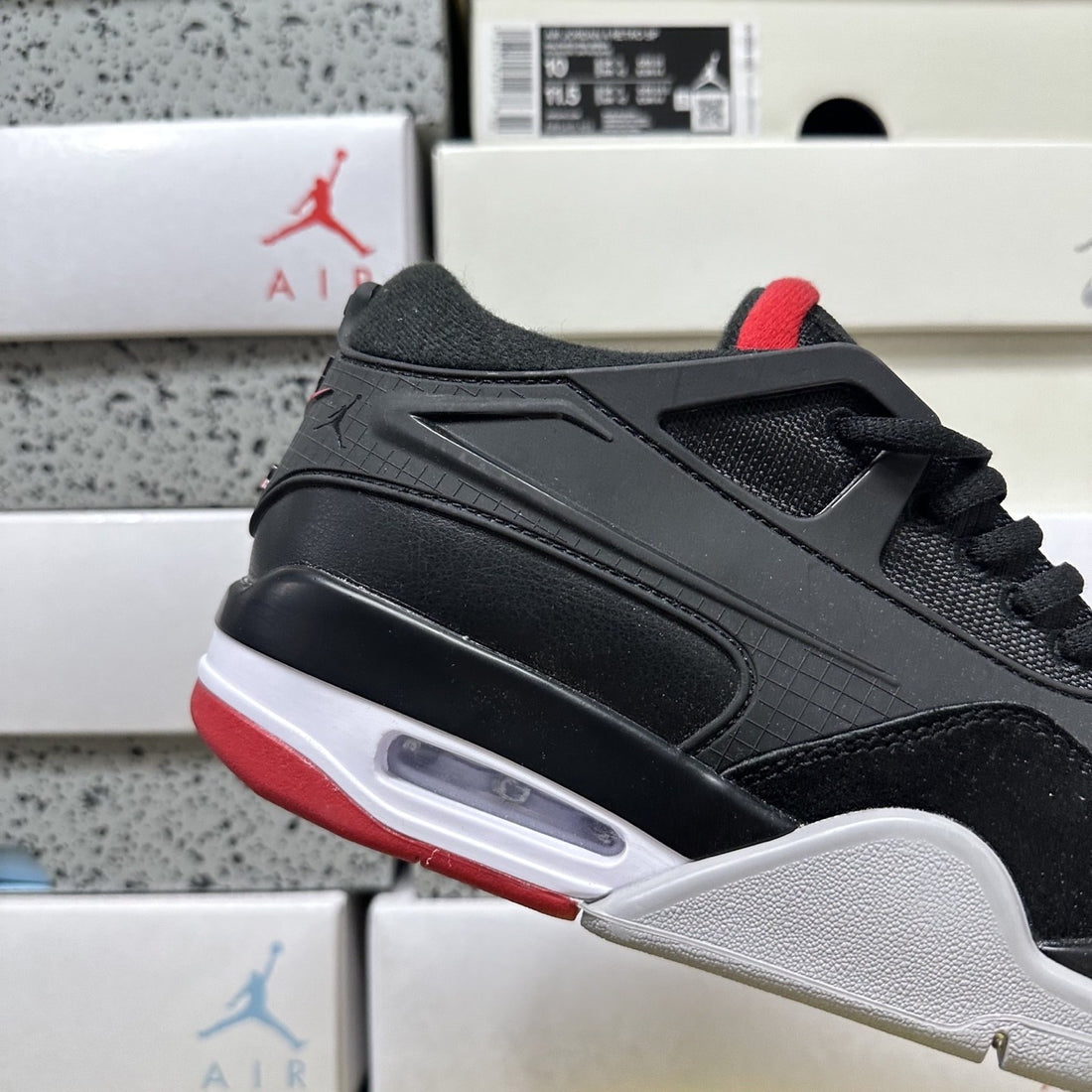 Air Jordan 4 RM Black Red Suede