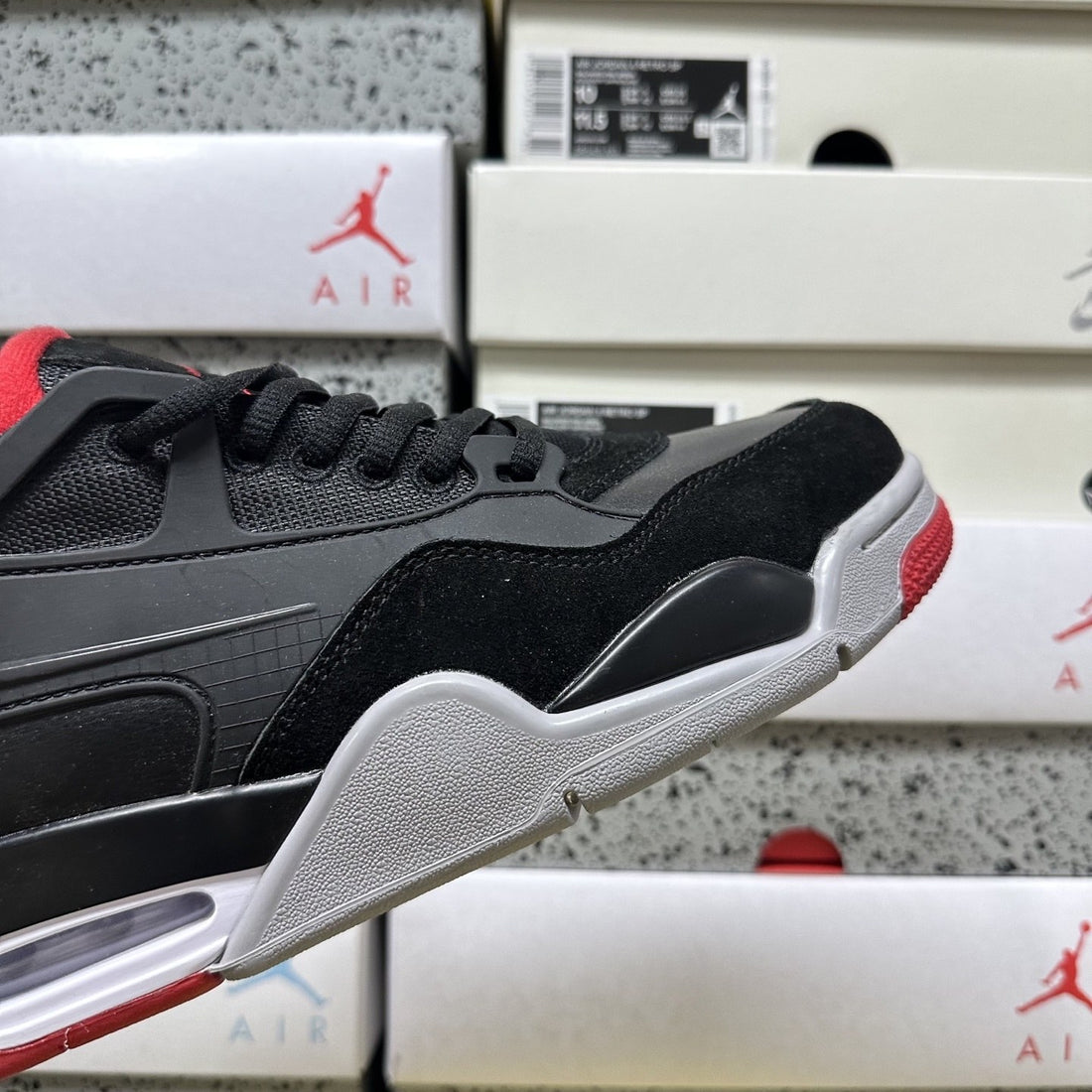 Air Jordan 4 RM Black Red Suede