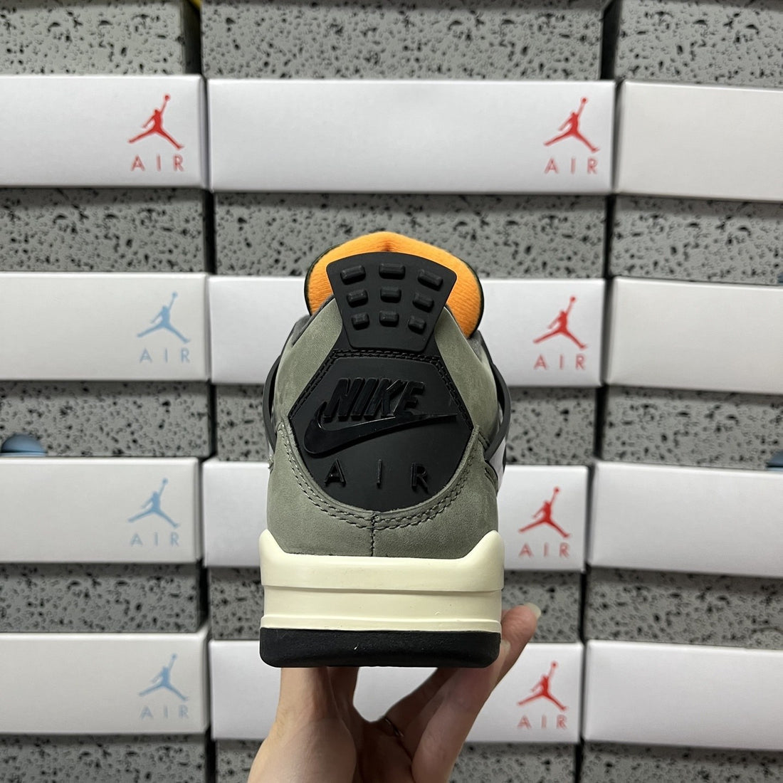 Air Jordan 4 Undefeated Olive Orange