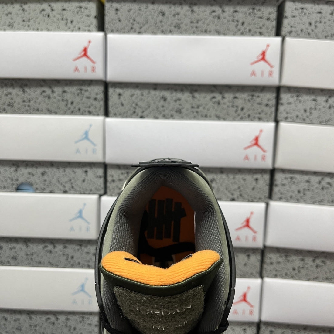 Air Jordan 4 Undefeated Olive Orange