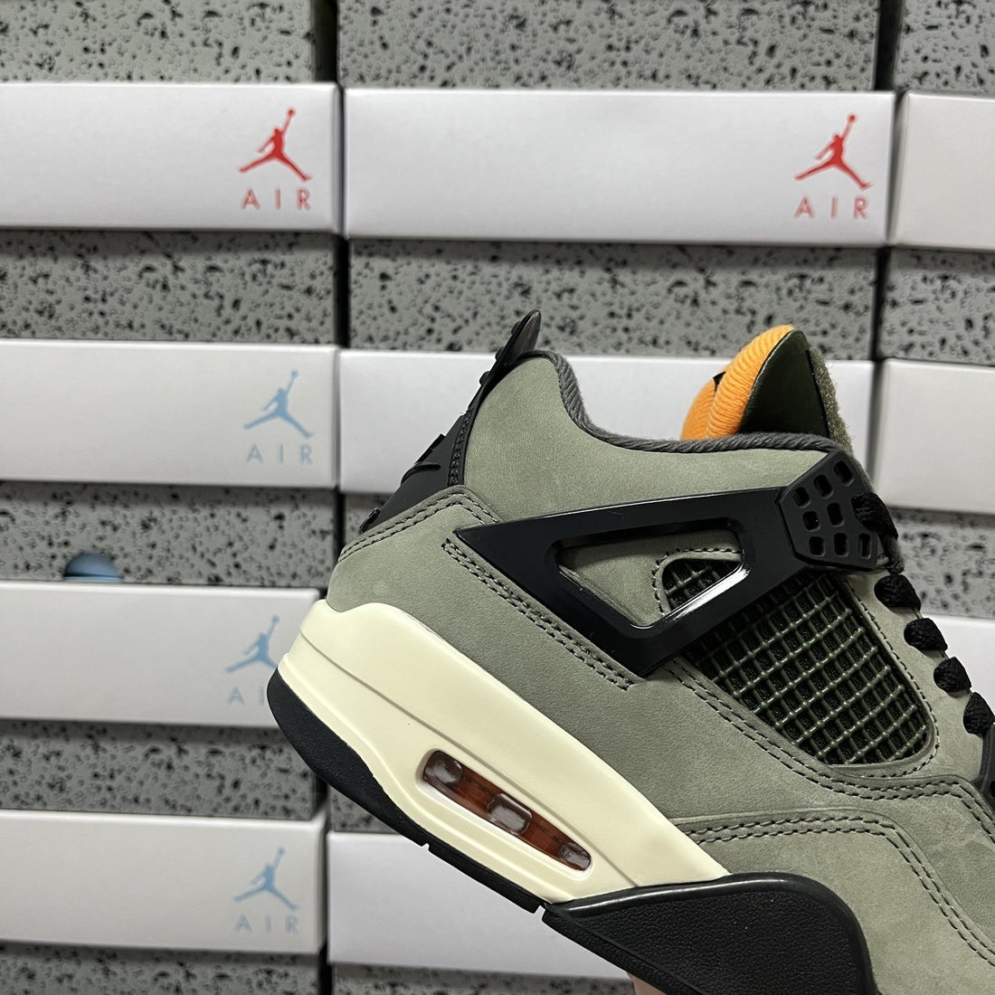 Air Jordan 4 Undefeated Olive Orange