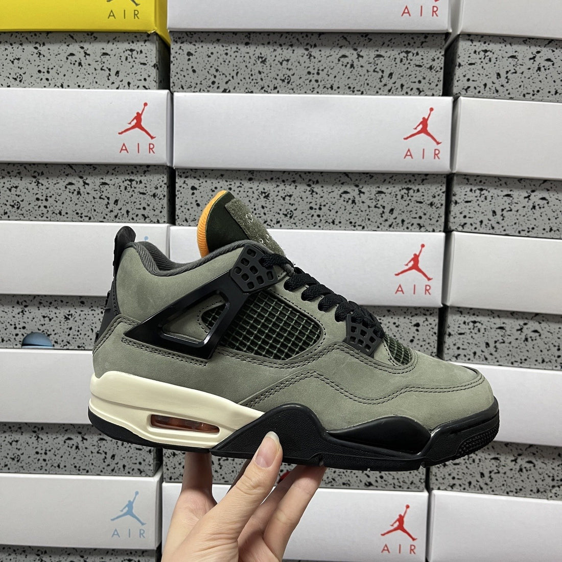 Air Jordan 4 Undefeated Olive Orange