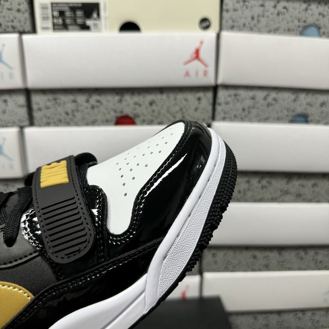 Jordan Legacy 312 Low Black Gold Patent