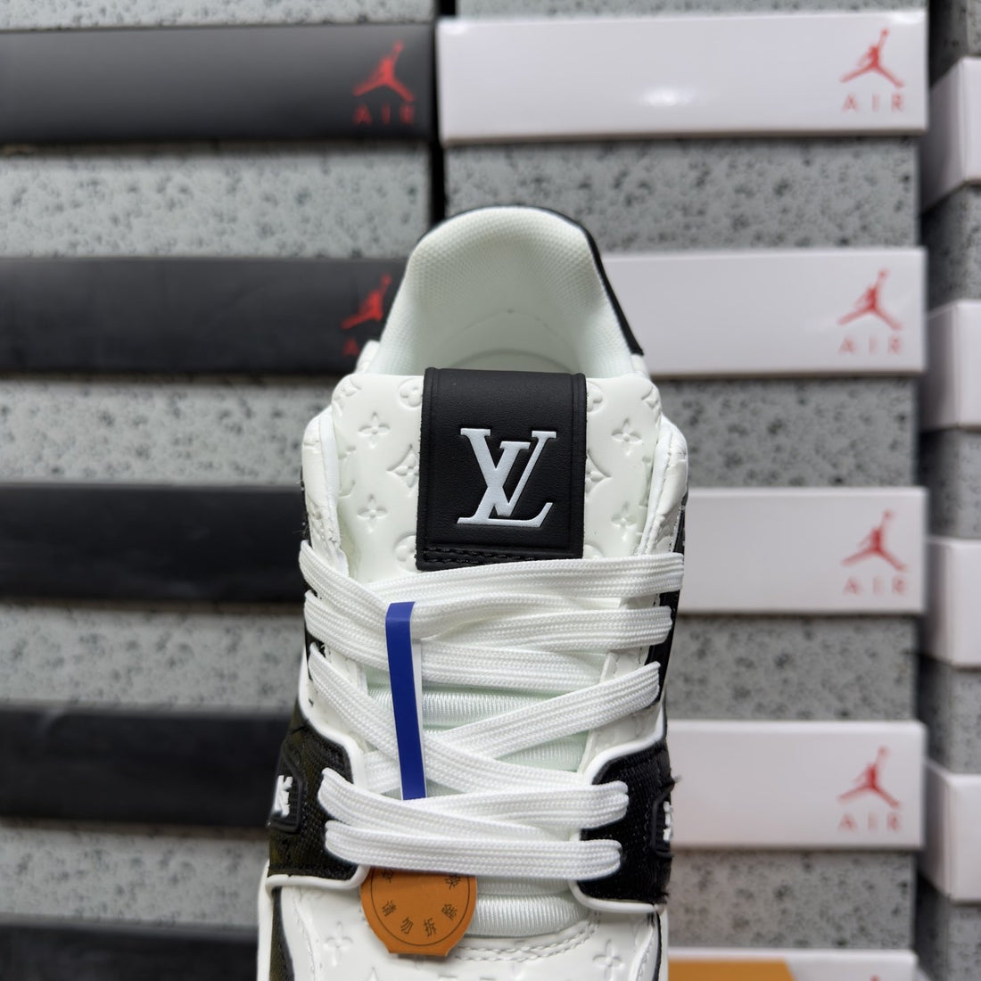 LV Trainer White Black Embossed