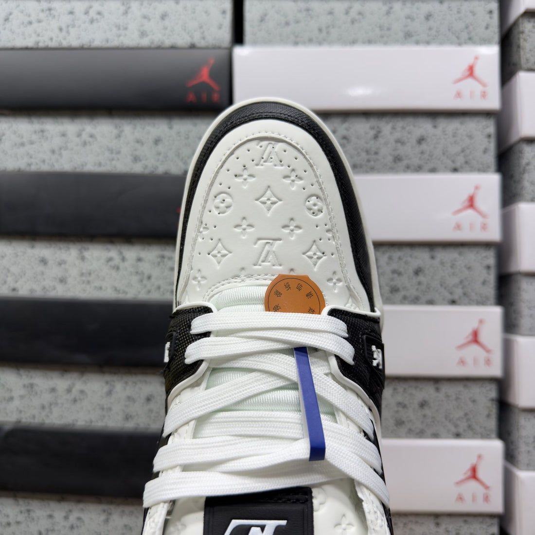 LV Trainer White Black Embossed
